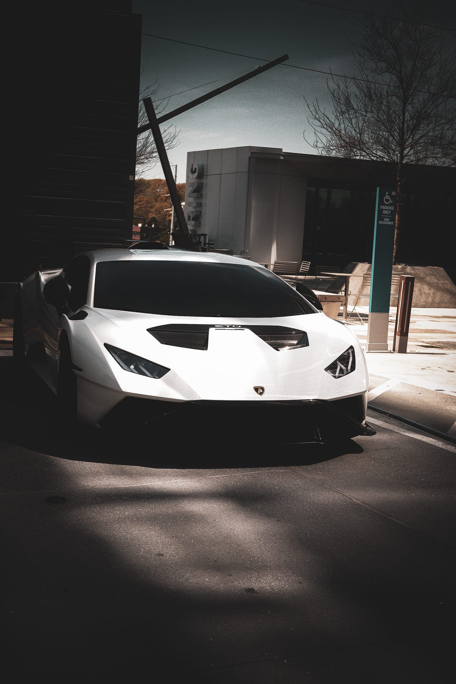 Lamborghini Huracán STO photographed at a three-quarter front angle in soft Atlanta light.